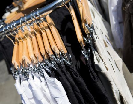 A clothes rack of pants in a store