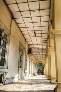 Corridor with sun light and shadow, old house of desolation.