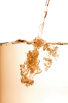 A copper toned water splash bubble image