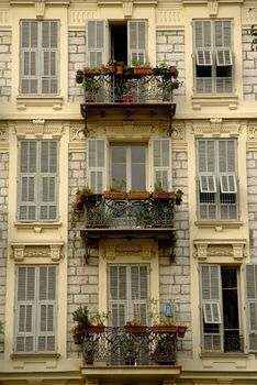 Street view of a typical iron casted balconies at a mediterranean  house.