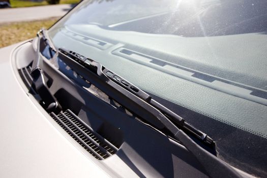 A windshield wiper detail on a car