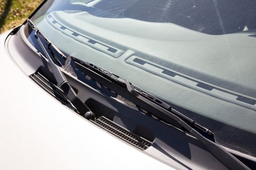 A windshield wiper detail on a car