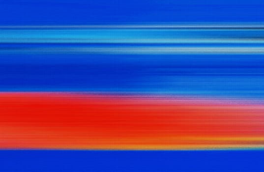 An abstract motion blur of red and blue