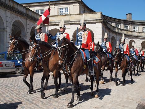 COPENHAGEN - APR 16: Denmark's Queen Margrethe celebrates her 70th birthday with other European Royals. The Queen rides an open carriage escorted by Hussars to Copenhagen City Hall on April 16, 2010.