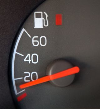 Gas Gauge showing nearly empty with red warning light