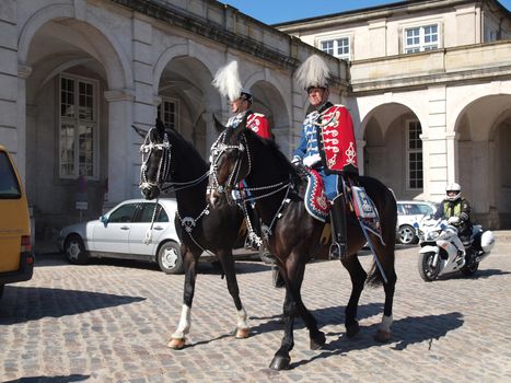 COPENHAGEN - APR 16: Denmark's Queen Margrethe celebrates her 70th birthday with other European Royals. The Queen rides an open carriage escorted by Hussars to Copenhagen City Hall on April 16, 2010.