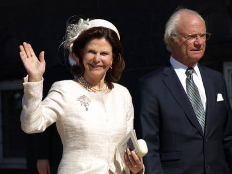 COPENHAGEN - APR 16: Denmark's Queen Margrethe celebrates her 70th birthday with other European Royals. The Queen rides an open carriage escorted by Hussars to Copenhagen City Hall on April 16, 2010.