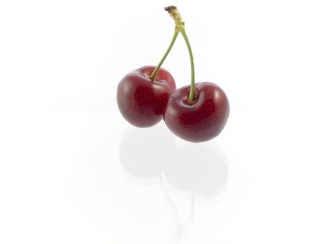 Close-up of sweet cherries isolated on white