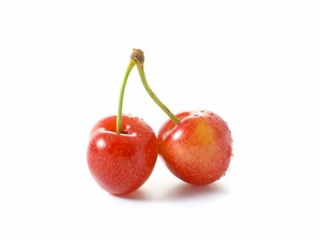 Close-up of sweet cherries isolated on white