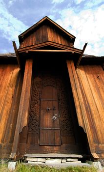 A medeival Door made of wood with carvings