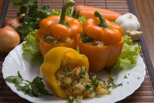 The sweet bulgarian pepper with vegetables and rice