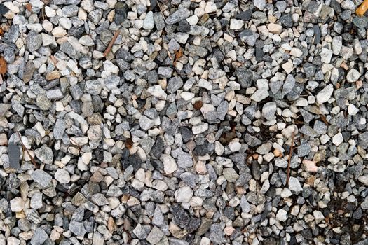 A background texture of small rocks