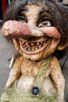 A happy troll looking at the camera