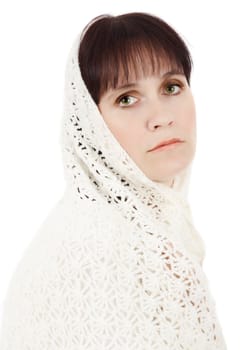 portrait of caucasian woman wearing a white knit chawl