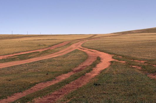 Shot of the crossroad at the desert steppe