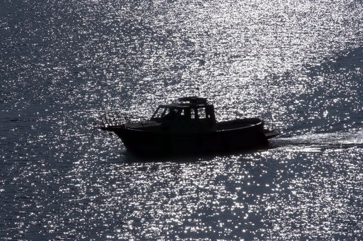 Shot of the boat on tne river - dusk