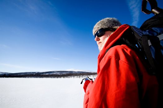 A female on a winter adventure trip in the mountains