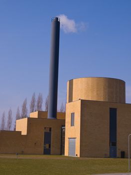 Factory plant building with a chimney modern industry background vertical