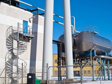 Factory plant industrial metal storage tanks manufacturing industry background