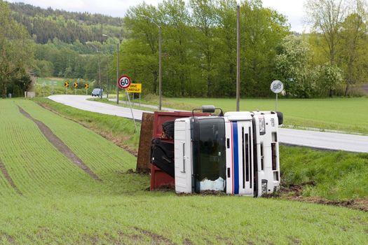 A truck tipped over after an accident