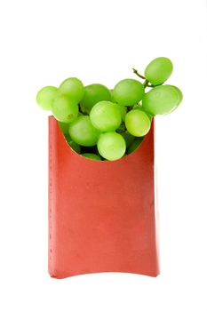 A healthy snack of grapes - contrasted in a french fries box