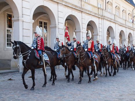 COPENHAGEN - APR 16: The Danish Royal guards on horses escorts the queen during the celebration of Queen Margrethe's 70th birthday on April 16, 2010 in Copenhagen, Denmark.
