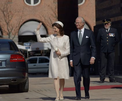 COPENHAGEN - APR 16: HRH Queen Silvia and King Harald of Sweden waves at the crowd during celebration of Queen Margrethe's 70th birthday on April 16, 2010 at Copenhagen City Hall.
