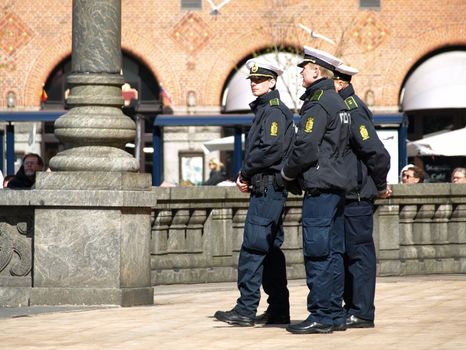 COPENHAGEN - APR 16:  Danish policemen guard and secure the Copenhagen City Hall during the 
celebration of Queen Margrethe's 70th birthday on April 16, 2010.
