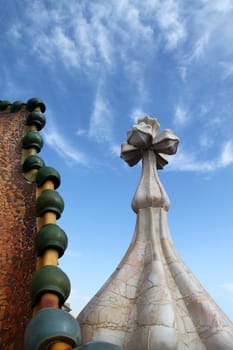 Chimney smoke stack shaped in a cross pattern with tiles