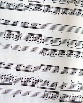A page of music with detailed paper texture