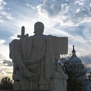 Back view of Authority of Law sculpture in front of Supreme Court building with in Washington DC, USA.