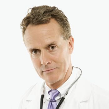 Portrait of a mid-adult Caucasian male doctor with stethoscope around his neck.