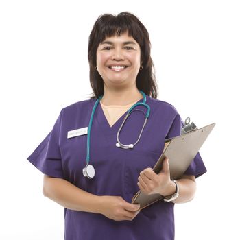 Middle-aged Filipino woman dressed in scrubs with stethoscope and clipboard.