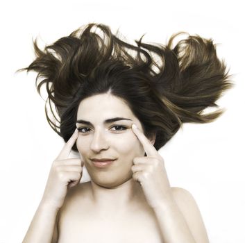 Young beautiful woman portrait isolated in a white background