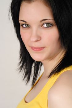 closeup portrait of a young woman with black hair