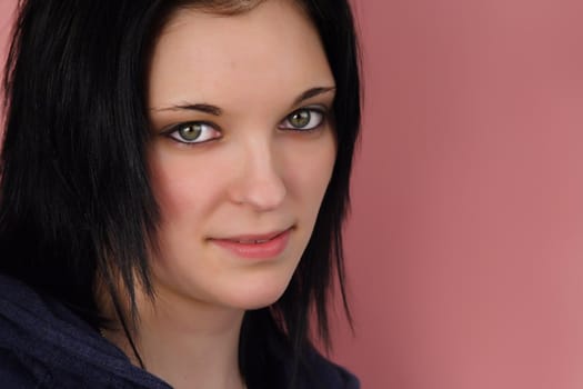 closeup portrait of a young woman with black hair