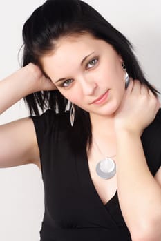 closeup portrait of a young woman with black hair