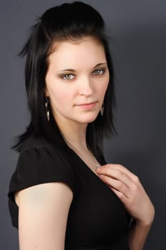 closeup portrait of a young woman with black hair