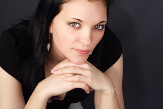 closeup portrait of a young woman with black hair