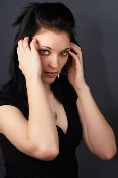 closeup portrait of a young woman with black hair
