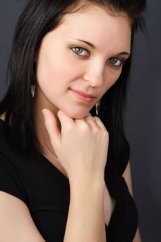 closeup portrait of a young woman with black hair