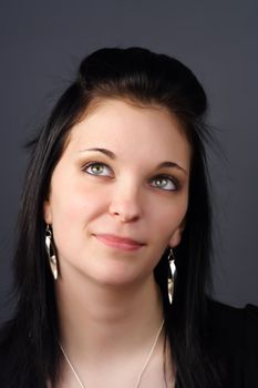 closeup portrait of a young woman with black hair