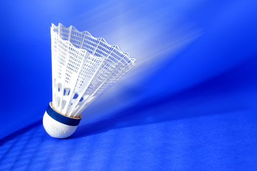 nylon badminton shuttlecock with blue background