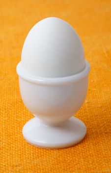 boiled egg on a white cup 