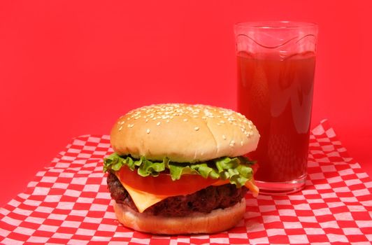 nice hamburger with tomato juice 