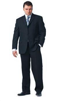 Full length of a confident young business man standing against white with one hand in his pocket 