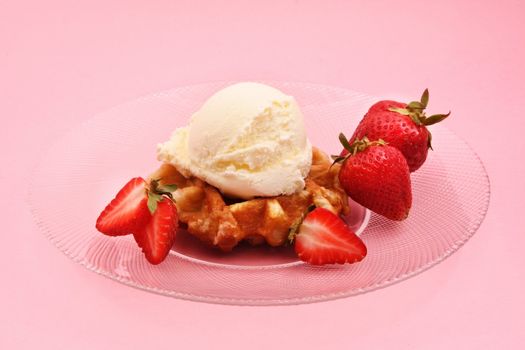 Belgian waffles with strawberries and ice cream