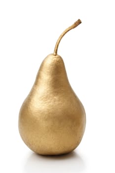 Metallic gold pear on white background