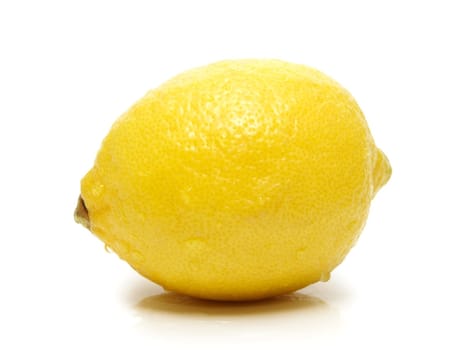 Whole lemon isolated on white background