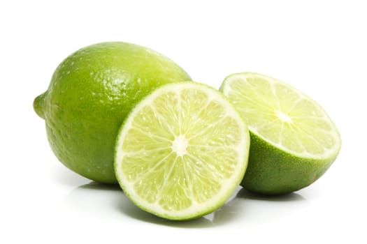 fresh lime on yellow background